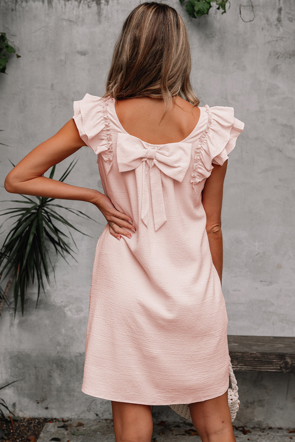 Abigail Textured Flutter Sleeve Bow Back Mini Dress by Threaded Pear