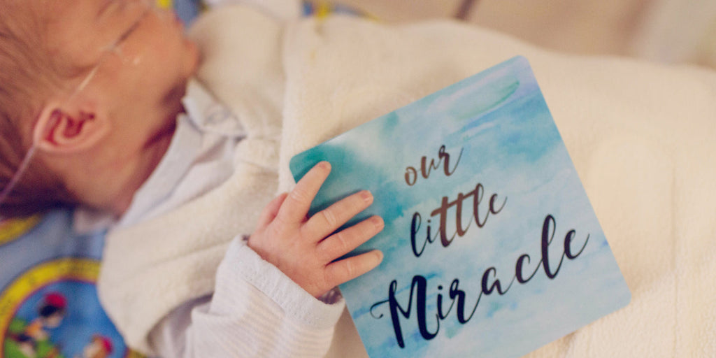 Little Miracle Preemie baby boy in the NICU. Document special moments in the neonatal unit with Three Little Tots NICU Milestone Cards 