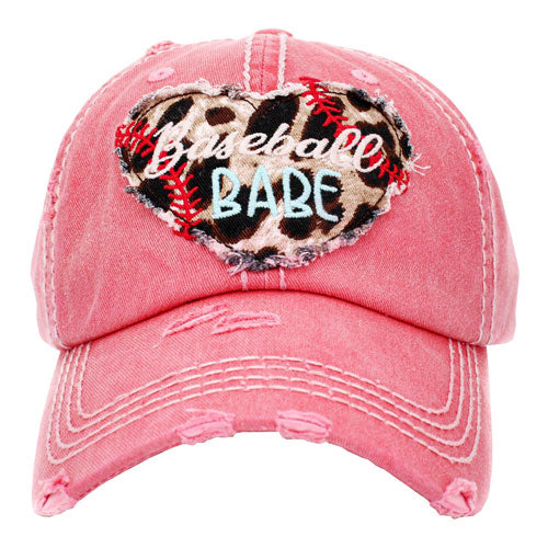 Pink Baseball Babe Leopard Patterned Heart Vintage Baseball Cap. Fun cool message themed vintage baseball cap. Perfect for walks in sun, great for a bad hair day. The distressed frayed style with faded colour gives it an awesome vintage look. Soft textured, embroidered message with fun statement will become your favourite cap.