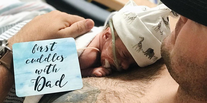 First preemie cuddles with dad photo in the NICU with Three Little Tots NICU Milestone Cards