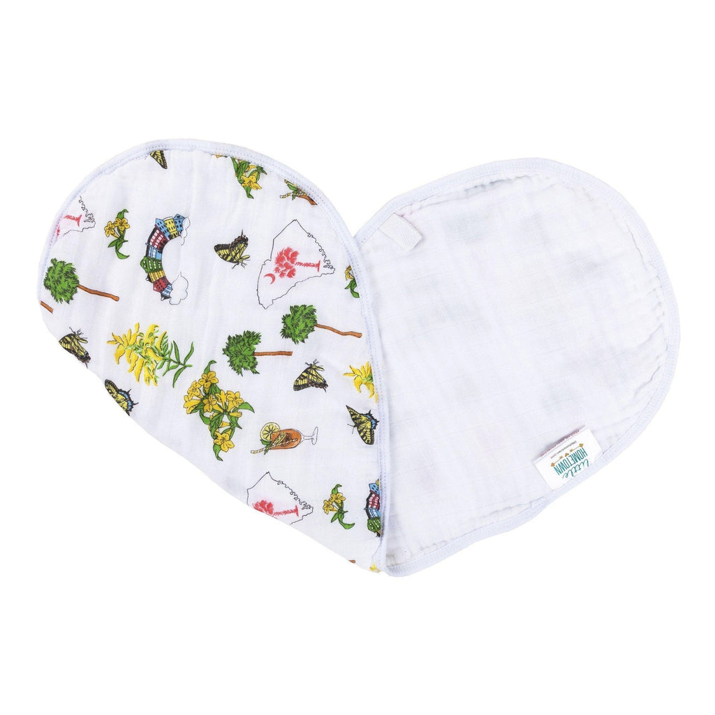 South Carolina-themed baby gift set with muslin swaddle blanket and burp cloth, featuring state icons and text.
