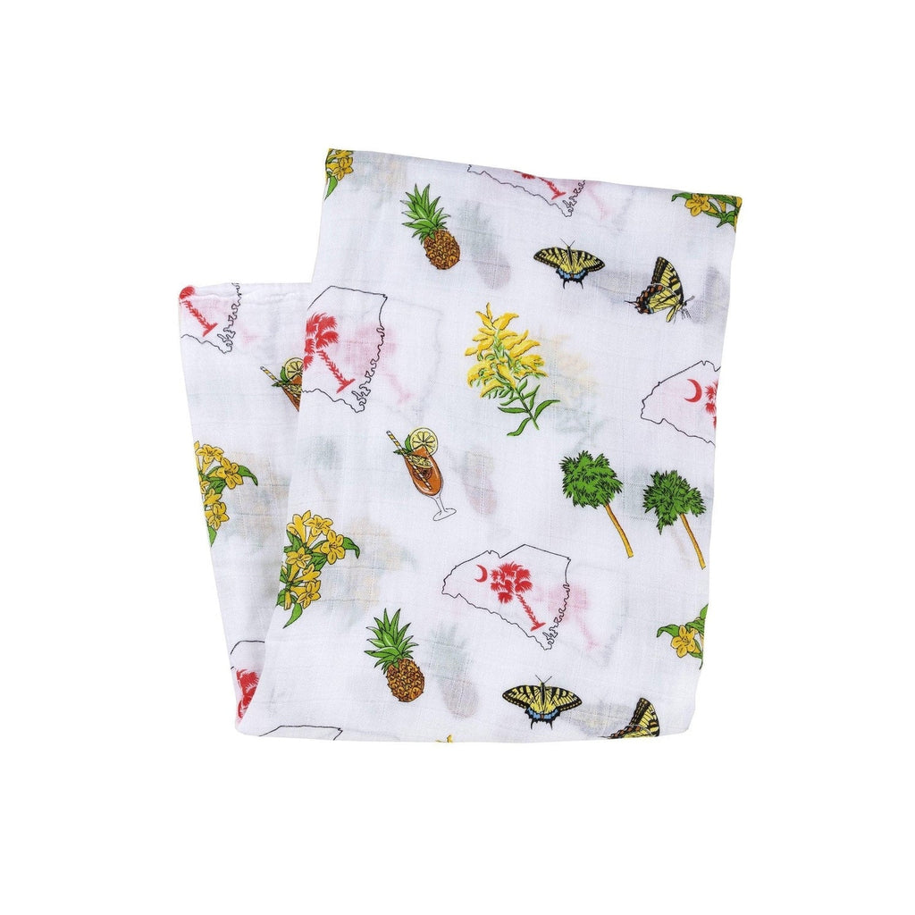South Carolina-themed baby gift set with muslin swaddle blanket and burp cloth/bib combo, featuring state icons.