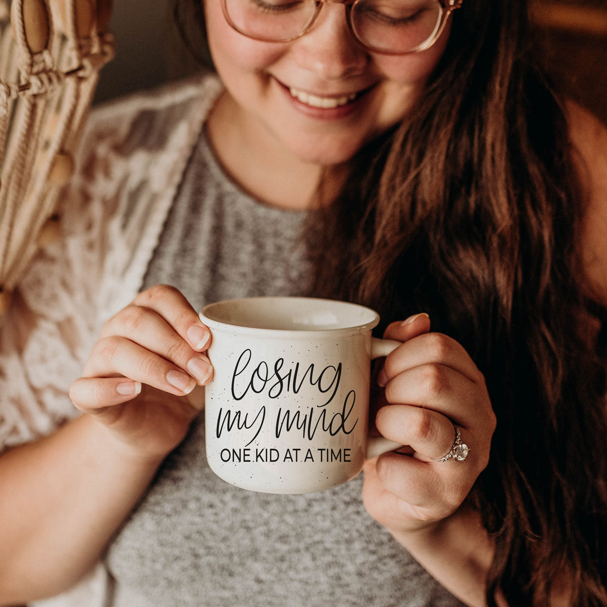 best funny mug for moms with multiple kids
gift idea for friend who is losing her mind with kids
parenting struggle humor mug losing my mind
cute neutral mug for chaotic family mornings
mom humor mug for sleep deprived parents
scripted quote losing my mind mug in woman’s hands