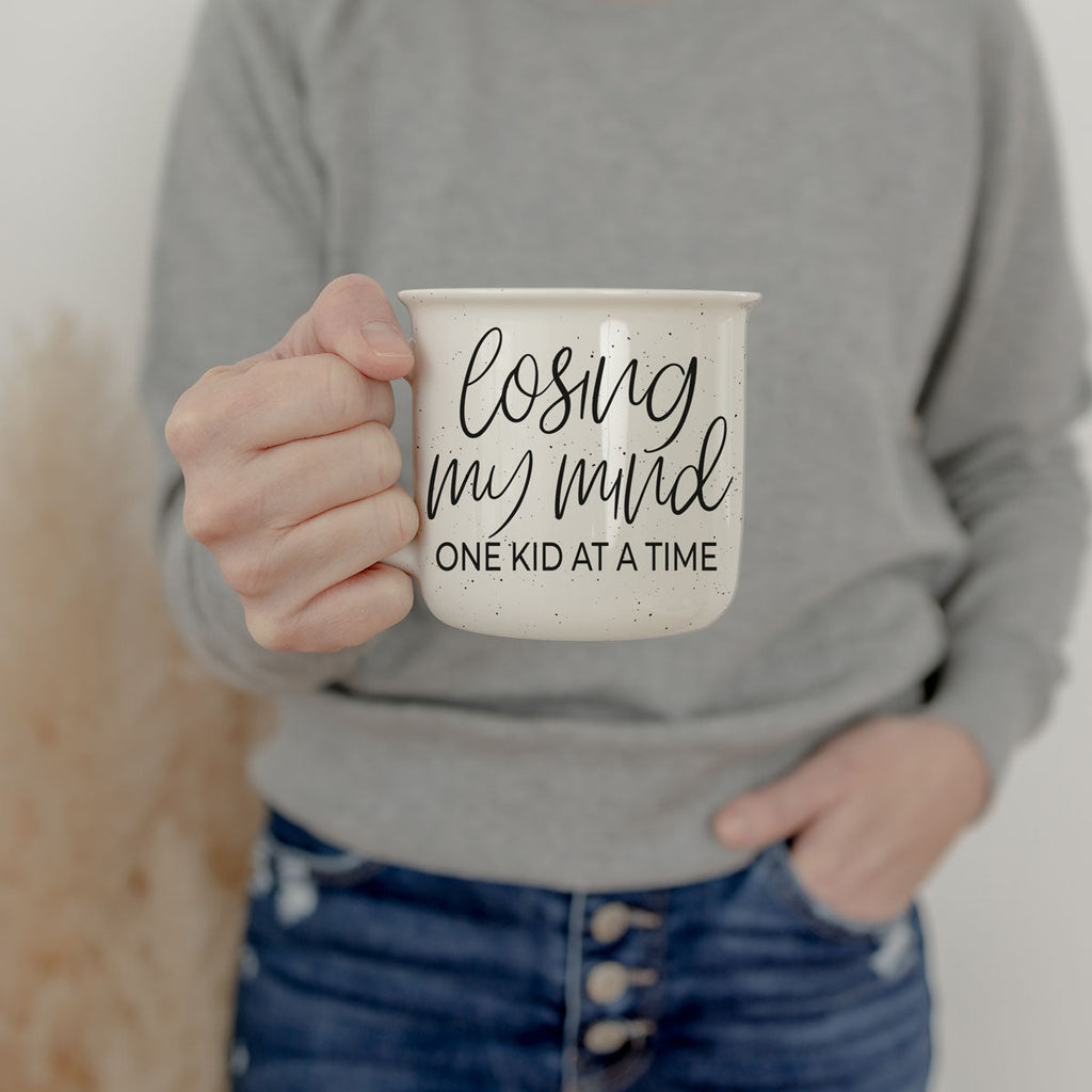 Sarcastic Wholesale coffee mugs in the usa for sale
closeup of losing my mind one kid at a time text on mug
funny coffee mug for stay at home moms
cute mom mug about losing sanity one kid at a time
Wholesale novelty mug for moms who need caffeine
losing my mind mom mug on white background