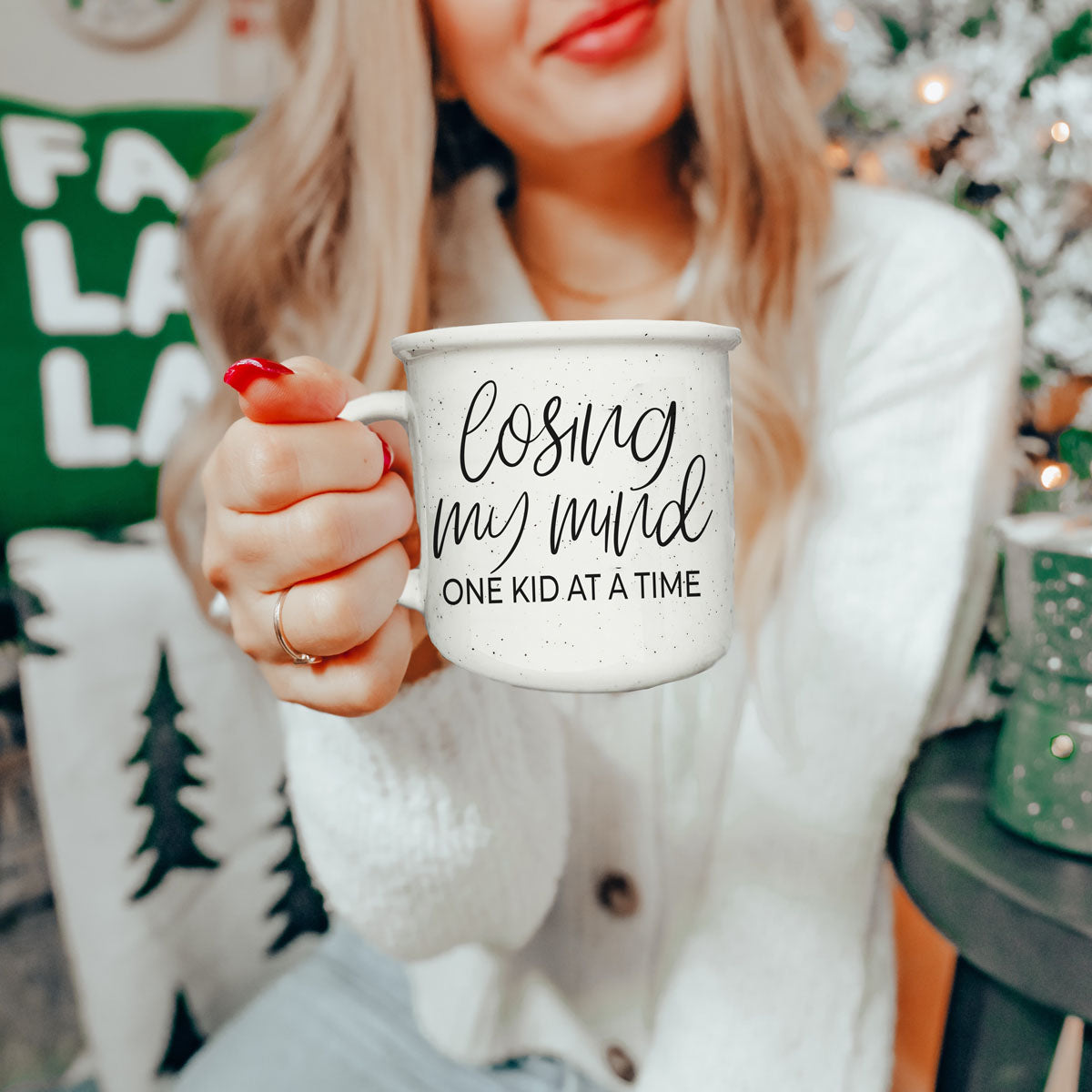 coffee mug for mom who needs five minutes alone
large ceramic mug for mom’s daily caffeine
lifestyle shot of funny motherhood coffee mug
mug for mom with loud wild kids
relatable mom quote mug for everyday use
funny mug for mom who lives in carline
motherhood survival coffee mug with script text
ceramic mug for moms who are always multitasking